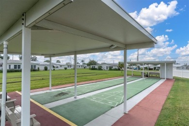 This beautiful renovated block-constructed home is in the 55+ on Mainlands Golf Club in Florida - for sale on GolfHomes.com, golf home, golf lot