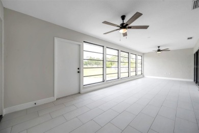 Spectacular golf course remodel! Plenty of room to add pool if on Palm Aire Country Club of Sarasota in Florida - for sale on GolfHomes.com, golf home, golf lot