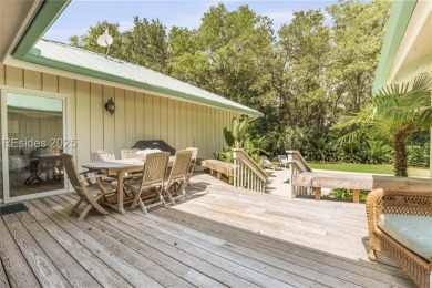 Just steps from the beach, this beautifully maintained 3-bedroom on Port Royal Golf and Racquet Club in South Carolina - for sale on GolfHomes.com, golf home, golf lot