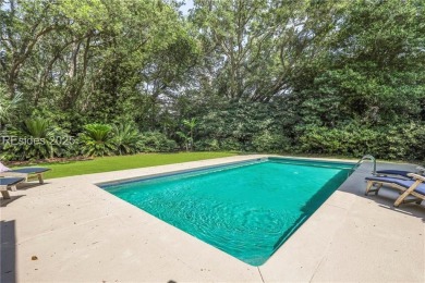 Just steps from the beach, this beautifully maintained 3-bedroom on Port Royal Golf and Racquet Club in South Carolina - for sale on GolfHomes.com, golf home, golf lot