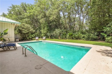Just steps from the beach, this beautifully maintained 3-bedroom on Port Royal Golf and Racquet Club in South Carolina - for sale on GolfHomes.com, golf home, golf lot