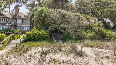 Just steps from the beach, this beautifully maintained 3-bedroom on Port Royal Golf and Racquet Club in South Carolina - for sale on GolfHomes.com, golf home, golf lot