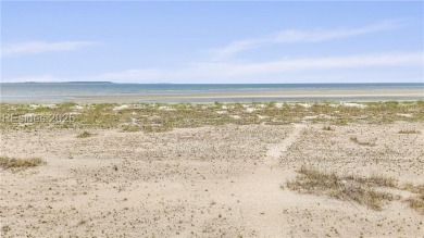 Just steps from the beach, this beautifully maintained 3-bedroom on Port Royal Golf and Racquet Club in South Carolina - for sale on GolfHomes.com, golf home, golf lot