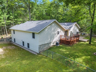 Pride of Ownership shows in this Custom Built Home. Four on Indian River Golf Club in Michigan - for sale on GolfHomes.com, golf home, golf lot