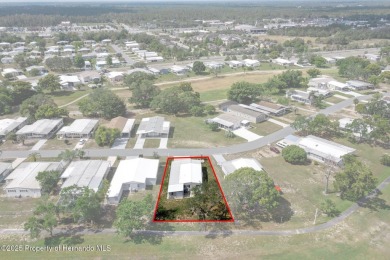 Check me out! Communiy pool! Own the land! Well-maintained 2/2 on High Point Golf Club, Inc. in Florida - for sale on GolfHomes.com, golf home, golf lot
