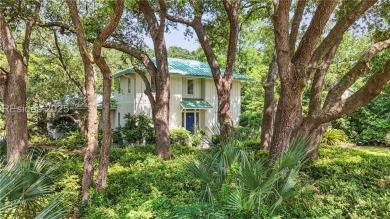 Just steps from the beach, this beautifully maintained 3-bedroom on Port Royal Golf and Racquet Club in South Carolina - for sale on GolfHomes.com, golf home, golf lot