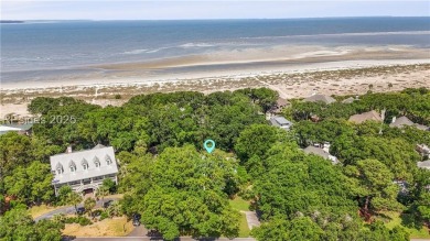 Just steps from the beach, this beautifully maintained 3-bedroom on Port Royal Golf and Racquet Club in South Carolina - for sale on GolfHomes.com, golf home, golf lot