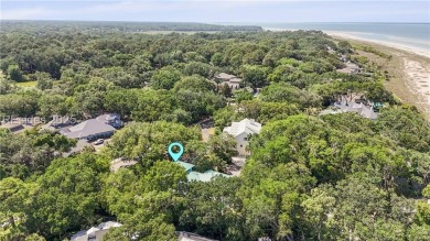 Just steps from the beach, this beautifully maintained 3-bedroom on Port Royal Golf and Racquet Club in South Carolina - for sale on GolfHomes.com, golf home, golf lot