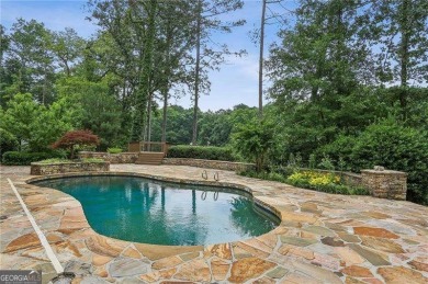 Tucked in Atlanta Country Club's quiet interior, this stately on Atlanta Country Club in Georgia - for sale on GolfHomes.com, golf home, golf lot