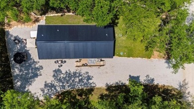 Welcome to your private retreat in the woods! This custom-built on Linn Valley Lakes - Deer Trace Golf Course in Kansas - for sale on GolfHomes.com, golf home, golf lot