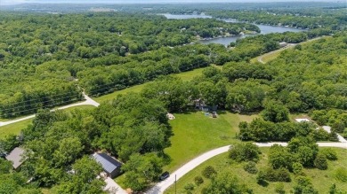 Welcome to your private retreat in the woods! This custom-built on Linn Valley Lakes - Deer Trace Golf Course in Kansas - for sale on GolfHomes.com, golf home, golf lot