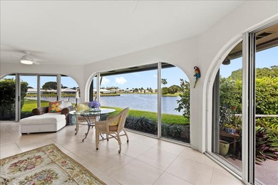 WATERFRONT GEM! Discover one of the largest villas in the highly on Atlantis Golf Club in Florida - for sale on GolfHomes.com, golf home, golf lot