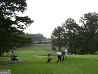 PERFECT LOCATION and MOVE-IN READY with wonderful curb appeal on on Canongate At Flat Creek Club in Georgia - for sale on GolfHomes.com, golf home, golf lot