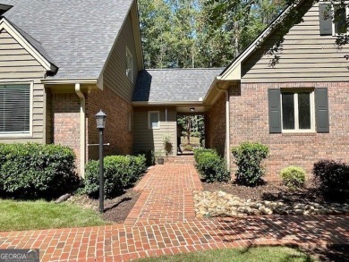 PERFECT LOCATION and MOVE-IN READY with wonderful curb appeal on on Canongate At Flat Creek Club in Georgia - for sale on GolfHomes.com, golf home, golf lot