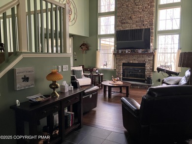 Seller has aggressively priced to sell this stunning on Pinecrest Lake Golf and Country Club in Pennsylvania - for sale on GolfHomes.com, golf home, golf lot