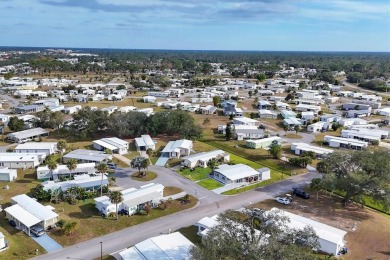 Holiday Park: A 55+ GATED COMMUNITY. CORNER LOT IN A CUL-DE-SAC on Sabal Trace Golf and Country Club in Florida - for sale on GolfHomes.com, golf home, golf lot