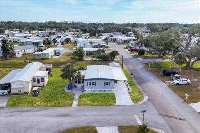 Holiday Park: A 55+ GATED COMMUNITY. CORNER LOT IN A CUL-DE-SAC on Sabal Trace Golf and Country Club in Florida - for sale on GolfHomes.com, golf home, golf lot