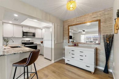 You will love coming home to this beautiful two-bedroom on Gulf Harbors Golf Course in Florida - for sale on GolfHomes.com, golf home, golf lot