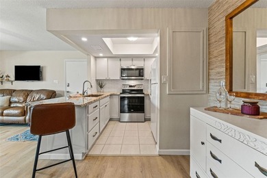 You will love coming home to this beautiful two-bedroom on Gulf Harbors Golf Course in Florida - for sale on GolfHomes.com, golf home, golf lot