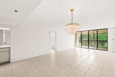 Discover this beautifully located condo in the highly on The Country Club At Boca Raton in Florida - for sale on GolfHomes.com, golf home, golf lot