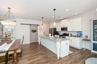 Built in 2021 and meticulously maintained, this 4-bedroom on The Frog Golf Club in Georgia - for sale on GolfHomes.com, golf home, golf lot