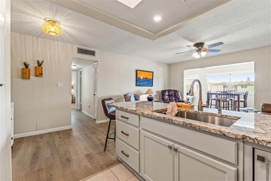 You will love coming home to this beautiful two-bedroom on Gulf Harbors Golf Course in Florida - for sale on GolfHomes.com, golf home, golf lot