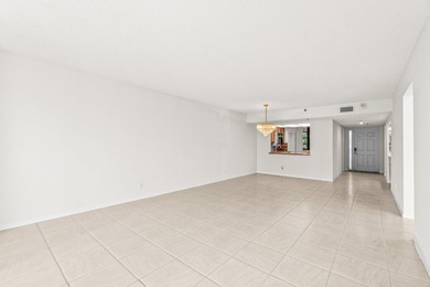 Discover this beautifully located condo in the highly on The Country Club At Boca Raton in Florida - for sale on GolfHomes.com, golf home, golf lot