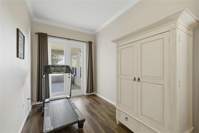 Experience refined Florida living in this beautifully enhanced on Candler Hills Golf and Country Club in Florida - for sale on GolfHomes.com, golf home, golf lot