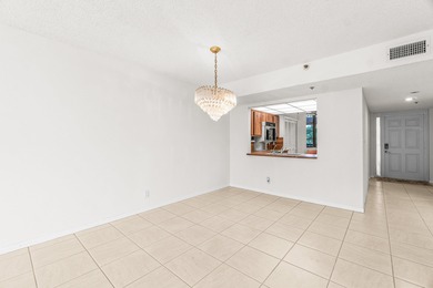 Discover this beautifully located condo in the highly on The Country Club At Boca Raton in Florida - for sale on GolfHomes.com, golf home, golf lot