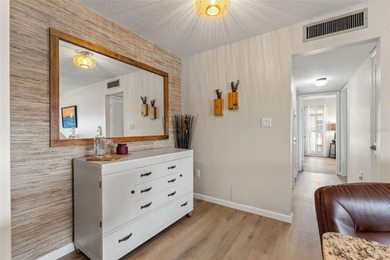 You will love coming home to this beautiful two-bedroom on Gulf Harbors Golf Course in Florida - for sale on GolfHomes.com, golf home, golf lot