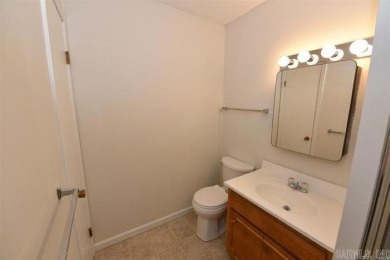 Welcome home to this charming 2-bedroom, 2-bathroom house! This on Mountain Ranch Golf Club in Arkansas - for sale on GolfHomes.com, golf home, golf lot
