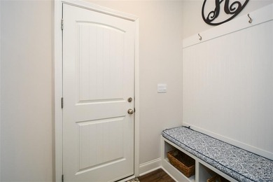 Built in 2021 and meticulously maintained, this 4-bedroom on The Frog Golf Club in Georgia - for sale on GolfHomes.com, golf home, golf lot