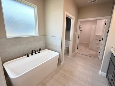 Welcome to 3714 Tremont Ln, Granbury, TX 76049; an open-concept on Pecan Plantation Country Club in Texas - for sale on GolfHomes.com, golf home, golf lot