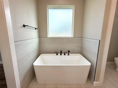 Welcome to 3714 Tremont Ln, Granbury, TX 76049; an open-concept on Pecan Plantation Country Club in Texas - for sale on GolfHomes.com, golf home, golf lot