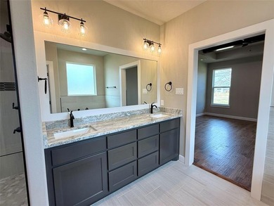 Welcome to 3714 Tremont Ln, Granbury, TX 76049; an open-concept on Pecan Plantation Country Club in Texas - for sale on GolfHomes.com, golf home, golf lot