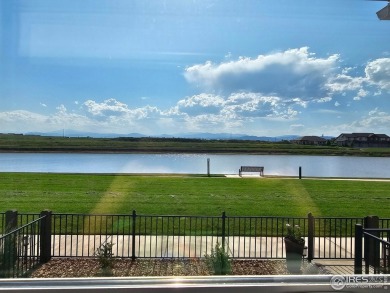 This beautiful 4 bed, 3.5 bath townhome offers lakefront living on Highland Meadows Golf Course in Colorado - for sale on GolfHomes.com, golf home, golf lot