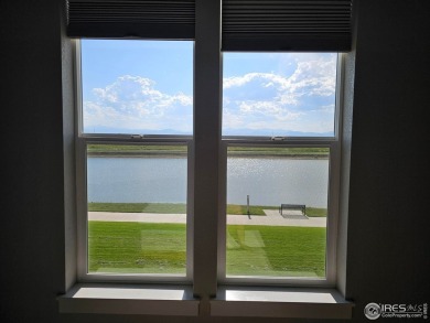 This beautiful 4 bed, 3.5 bath townhome offers lakefront living on Highland Meadows Golf Course in Colorado - for sale on GolfHomes.com, golf home, golf lot