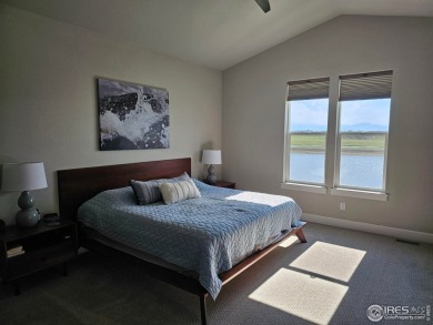 This beautiful 4 bed, 3.5 bath townhome offers lakefront living on Highland Meadows Golf Course in Colorado - for sale on GolfHomes.com, golf home, golf lot
