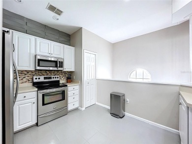 Welcome to 776 Grasslands Village Circle, an elegant upstairs on Grasslands Golf and Country Club in Florida - for sale on GolfHomes.com, golf home, golf lot
