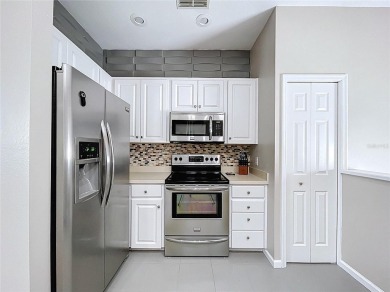 Welcome to 776 Grasslands Village Circle, an elegant upstairs on Grasslands Golf and Country Club in Florida - for sale on GolfHomes.com, golf home, golf lot