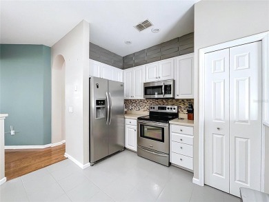 Welcome to 776 Grasslands Village Circle, an elegant upstairs on Grasslands Golf and Country Club in Florida - for sale on GolfHomes.com, golf home, golf lot
