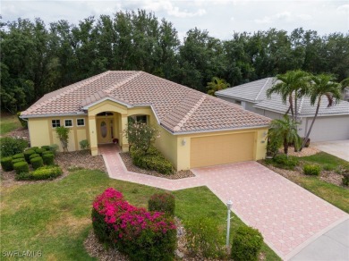 Modern comfort meets timeless charm in this exceptional on Herons Glen Golf and Country Club in Florida - for sale on GolfHomes.com, golf home, golf lot