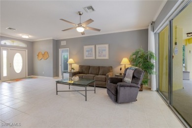 Modern comfort meets timeless charm in this exceptional on Herons Glen Golf and Country Club in Florida - for sale on GolfHomes.com, golf home, golf lot