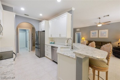Modern comfort meets timeless charm in this exceptional on Herons Glen Golf and Country Club in Florida - for sale on GolfHomes.com, golf home, golf lot