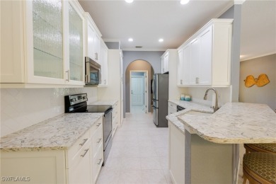 Modern comfort meets timeless charm in this exceptional on Herons Glen Golf and Country Club in Florida - for sale on GolfHomes.com, golf home, golf lot