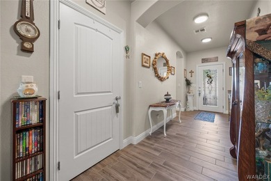 Beautiful home located in the gated community of The Enclave at on Laughlin Ranch Golf Club in Arizona - for sale on GolfHomes.com, golf home, golf lot