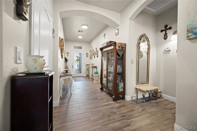 Beautiful home located in the gated community of The Enclave at on Laughlin Ranch Golf Club in Arizona - for sale on GolfHomes.com, golf home, golf lot