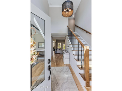 A fresh take on coastal living-this home offers a quieter, more on Carolina National Golf Club in North Carolina - for sale on GolfHomes.com, golf home, golf lot