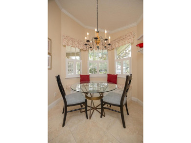 Bright,Cheerful & Immaculate Waterfront Home In Premier 55+ on Slammer and Squire Golf Course in Florida - for sale on GolfHomes.com, golf home, golf lot