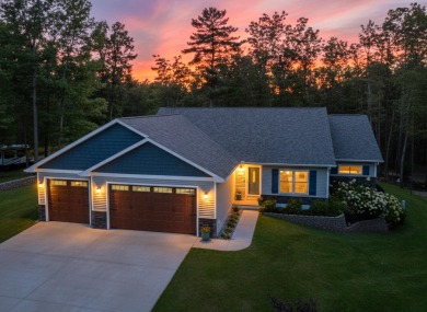 Meticulously maintained and beautifully updated, this stunning on Indian River Golf Club in Michigan - for sale on GolfHomes.com, golf home, golf lot